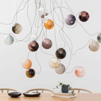 Distinguished Bocci 28 sculptural lamp with hand-blown glass spheres in amber, brown, gray, white, pink, and clear tones with milk white interiors