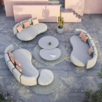 Distinguished Royal Botania Organix lounge sofa with kidney-shaped seating, light grey textile upholstery and peach-colored cushions for adaptable style