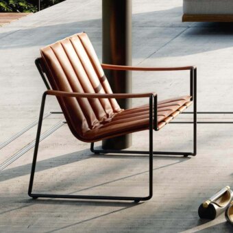 Captivating Royal Botania Strappy lounge chair with coated stainless steel and brown eco-leather straps in a matte black finish