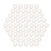 Glass sphere lights arranged in a heart shape against a white backdrop, emitting a warm yellow glow from recessed sources.